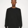 Mads Nørgaard NEW STANDARD CREW - Sweatshirt - Black - Herren -Mads Nørgaard Verkäufe 2022 bed9b1d37574493b92bee773695a7495