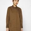 Modström ARTHUR - Hemdbluse - Sienna - Damen 1 Modström ARTHUR - Hemdbluse - Sienna - Damen -Mads Nørgaard Verkäufe 2022 c61ee5b692374422ace9d2bd4655ac88